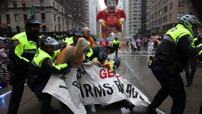 Anti-Israel protesters try to block Macy's Thanksgiving Day Parade route