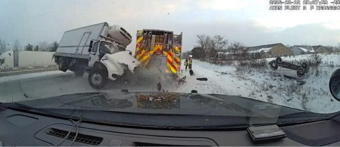 Dramatic video shows truck slam into first responder vehicles